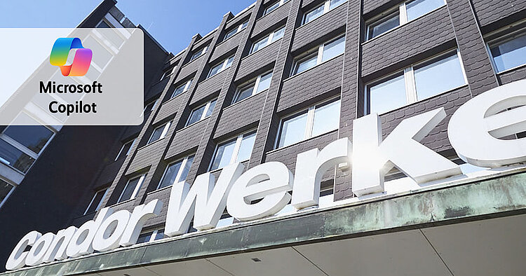 Außenansicht eines mehrstöckigen Gebäues mit großem weißen Schriftzug über dem Eingang "Condor Werke". In der linken Ecke ist das Logo von Microsoft Copilot eingeblendet.