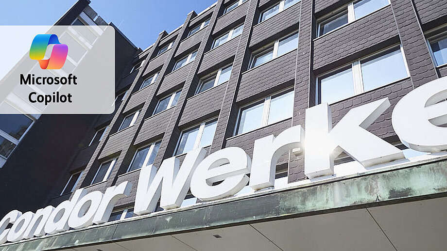 Außenansicht eines mehrstöckigen Gebäues mit großem weißen Schriftzug über dem Eingang "Condor Werke". In der linken Ecke ist das Logo von Microsoft Copilot eingeblendet.
